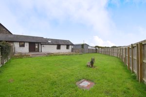 Rear elevation and enclosed garden - click for photo gallery